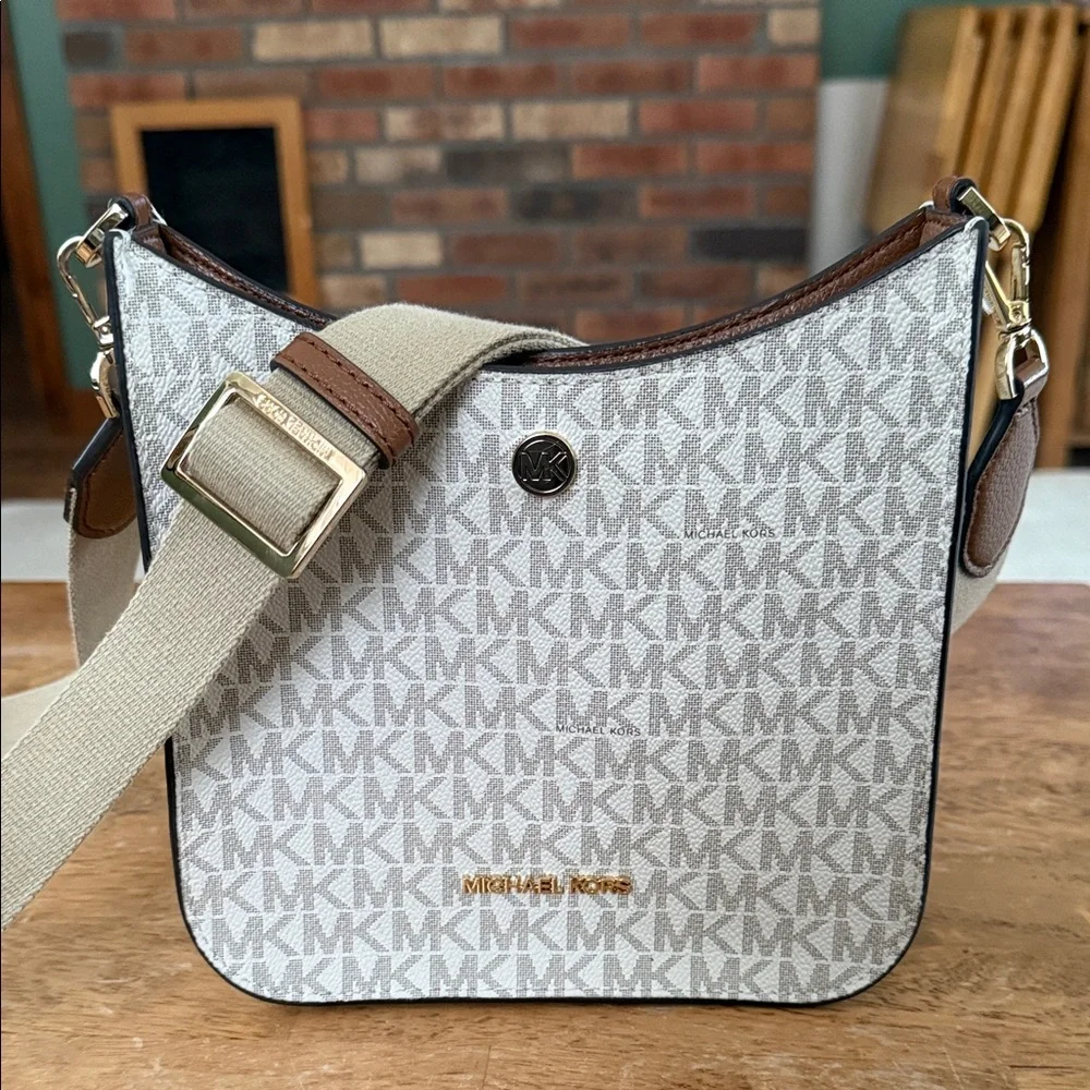 Michael Kors Briley Small Logo Messenger Bag in the vanilla color. Crossbody Bag - Picture 1 of 6